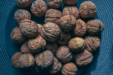 walnuts on the table lit by the window