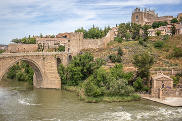 Puente de San Mart&iacute;n with Medieval Architecture in Toledo. Historical Town with Tagus River in Spain.