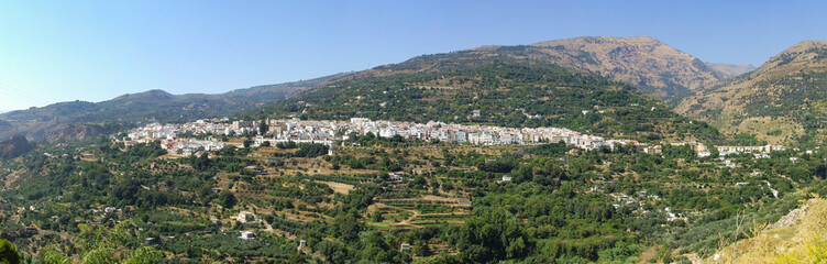 View from Mirador del Visillo towards Lanjar&oacute;n, a white-washed village in the Alpujarras in the Sierra Nevada mountain range in the province of Granada, Andalusia, Spain