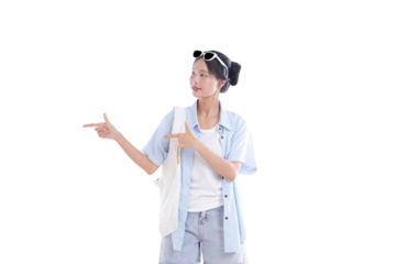 Adventurous Explorer's Guidance: A young woman with sunglasses points toward a destination. She is ready to go on a travel adventure.