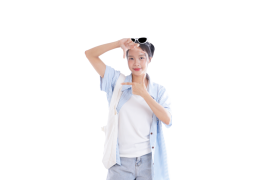 Framing the Moment: A young woman uses her hands to frame an imaginary scene, her smile hinting at a world of possibilities. It encapsulates anticipation, vision, and a desire to explore.