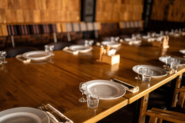Cozy restaurant table setting with wooden decor