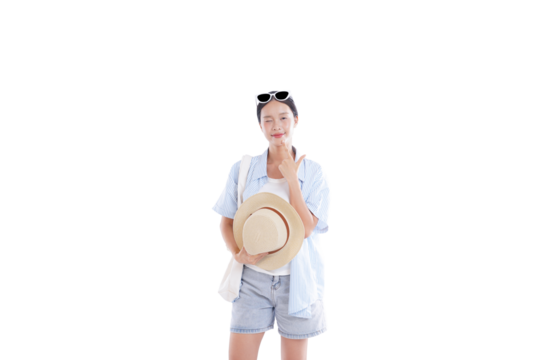 Serene Vacationer: A young woman exudes relaxation and confidence, holding a sun hat. She is captured in a moment of tranquility and anticipation.