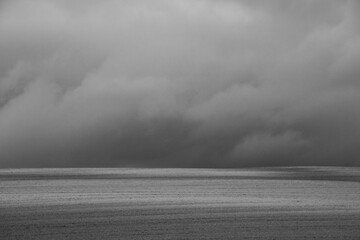 stormy clouds over fields