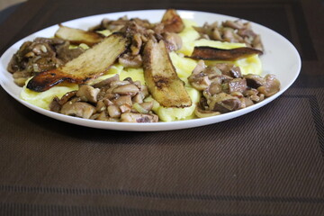 Traditional dish of mashed potatoes with mushrooms