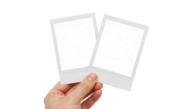Hand holding two blank polaroid photo frames. Mockup for your picture. Isolated on transparent background, png
