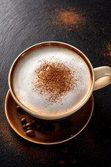 Close-up of cappuccino in clear glass cup promoting educational understanding of coffee preparation and inspiring cultural appreciation among young learners
