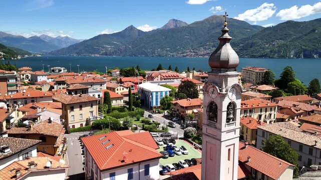 Explore Menaggio Italy with stunning views of Lake Como and beautiful rooftops on a clear day