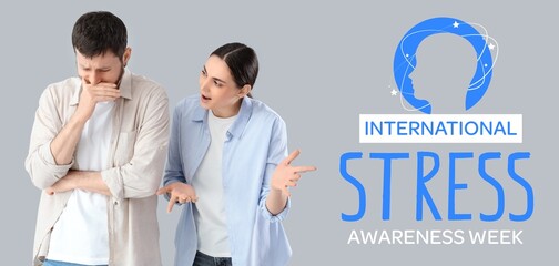 Young woman quarreling with her husband on grey background. International Stress Awareness Week