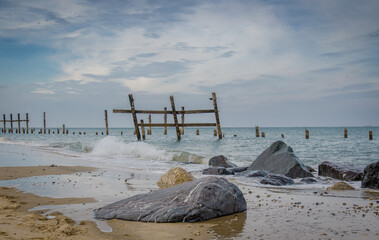 old sea defences on beach