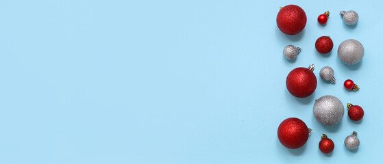 Beautiful composition with Christmas balls on blue background