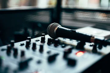 Fototapete Rund Minecraft Professional microphone on DJ mixer sound equipment audio recording studio music production broadcasting console control  © YARphotographer