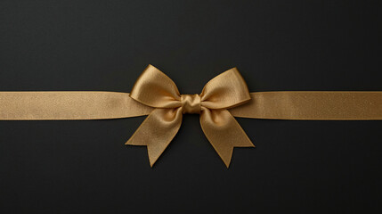 Fototapeta premium Golden Ribbon Bow on Black Background – Luxury Studio Product Presentation