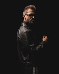 side view of cool young man with sunglasses looking forward