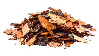 Pile of shredded tree bark, various shades of brown, on black