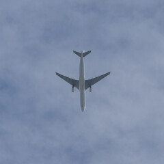 Plane in full flight on a clear blue sky over Sydney Australia