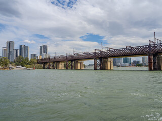 Fototapeta premium 11 October 2025 steel bridge for trains on Parramatta River Sydney Harbour on a warm spring cloudy overcast day in Sydney NSW Australia