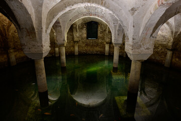 Ravenna, Italy - September 29 2025: Sunken, flooded Crypt of San Francesco Basilica Church