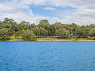 11 October 2025 Residential Houses and apartment buildings on Parramatta River Sydney Harbour on a warm spring cloudy overcast day in Sydney NSW Australia