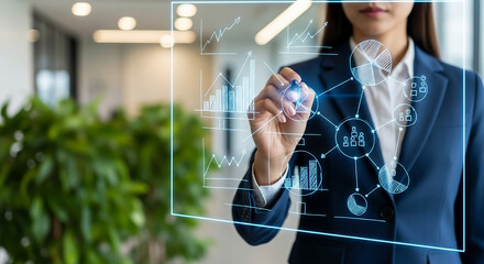 Image of woman drawing chart on transparent board, representing data visualization and strategic planning for business success, in corporate scene