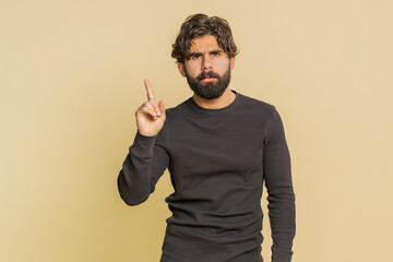 Lebanese man shakes finger, dislike and saying No, be careful, scolding, giving advice to avoid...