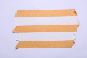 Strips of masking tape on white background