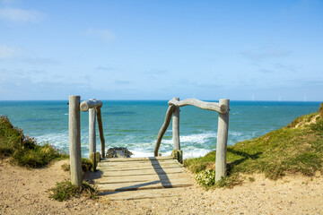 Different vacation impressions from denmark west coast with lighthouse, boats, dunes, footpath, windmills