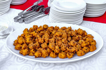 Delicious Indian Pakora Appetizer Served on a White Platter