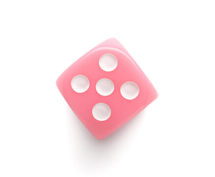 Pink game dice on white background