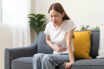 Fototapeta premium woman have stomach pain from menstruation