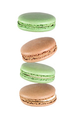 Sweet dessert composition: levitation of pastel macarons isolated on transparent background.