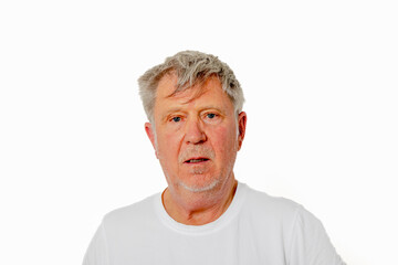 Obraz premium attractive handsome senior man with grey hair smiling and looking happy