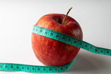 Red Apple with Measuring Tape