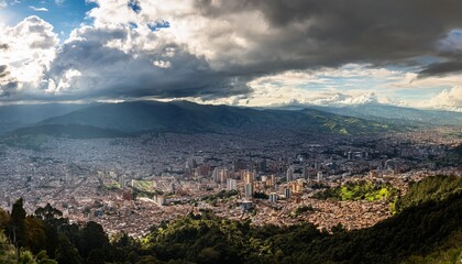 Obraz premium panorama of the high plateau with the colombian capital bogota with dramatic cloudy sky and sunlight