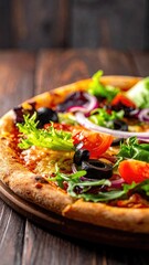 Delicious fresh pizza with fresh greens and vegetables on a wooden table.