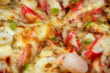 Macro Close-up of Crispy Cheese on Seafood Pizza