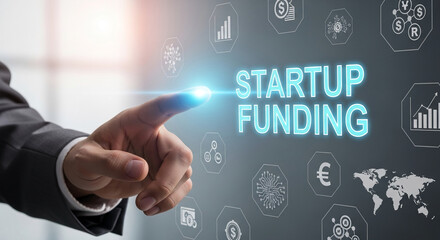 Hand touches "Startup Funding" text with financial icons on digital screen, representing investment, business growth, and innovative technology future