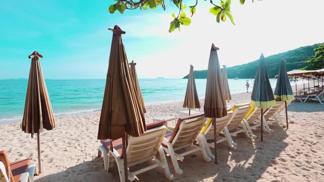 Empty beach chair on white sand beach windy sunset sky summer vacation background