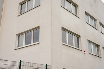Building facade corner with modern minimalist windows