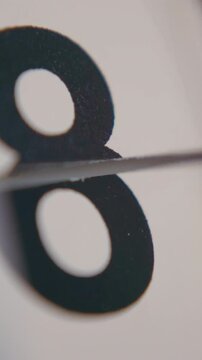 Close-up shot of date number field on a flip calendar rapidly changing