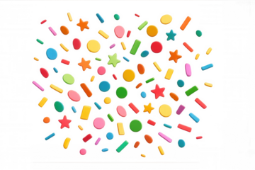 Colorful candy sprinkles and confetti shapes including stars, circles, and rectangular jimmies, on transparent background