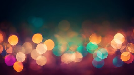 Warm festive city lights blur beautifully creating a bokeh background with deep teal and purple colors.