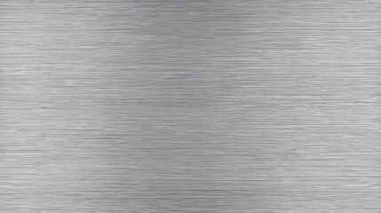 A brushed metal texture displays horizontal grain with subtle variations of light and shadow effects across it.