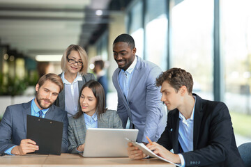 Business people working on new project at modern office