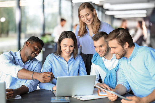 startup business team on meeting in modern bright office interior brainstorming, working on laptop and tablet computer