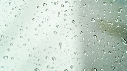 Abstract focus to blur of drop water. Drop of water on the glass after rainy.