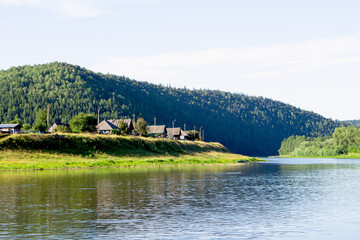 photo of the Ural River. hills and trees around