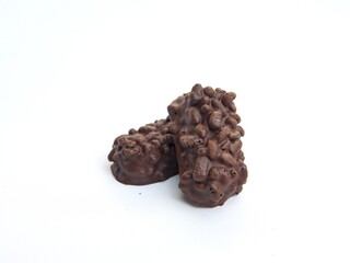 Two small chocolate bars with puffed rice crispy  on a white background. Perfect for snack and confectionary concepts.