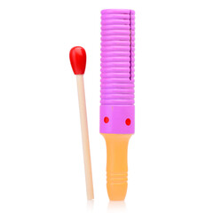 Pink musical percussion instrument guiro on a white background.