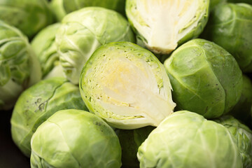 Fresh Brussels Sprouts in a black plate. Healthy food.